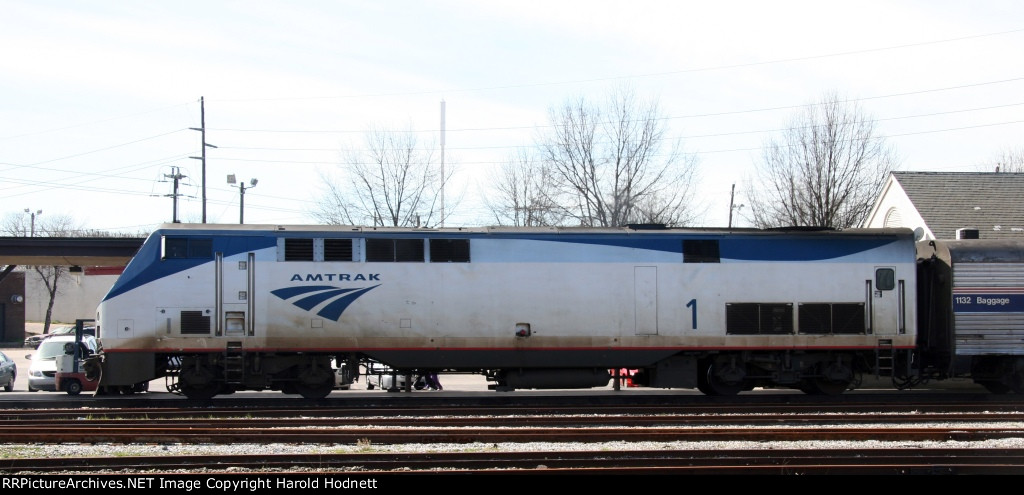 AMTK 1 brings train 80 into the station